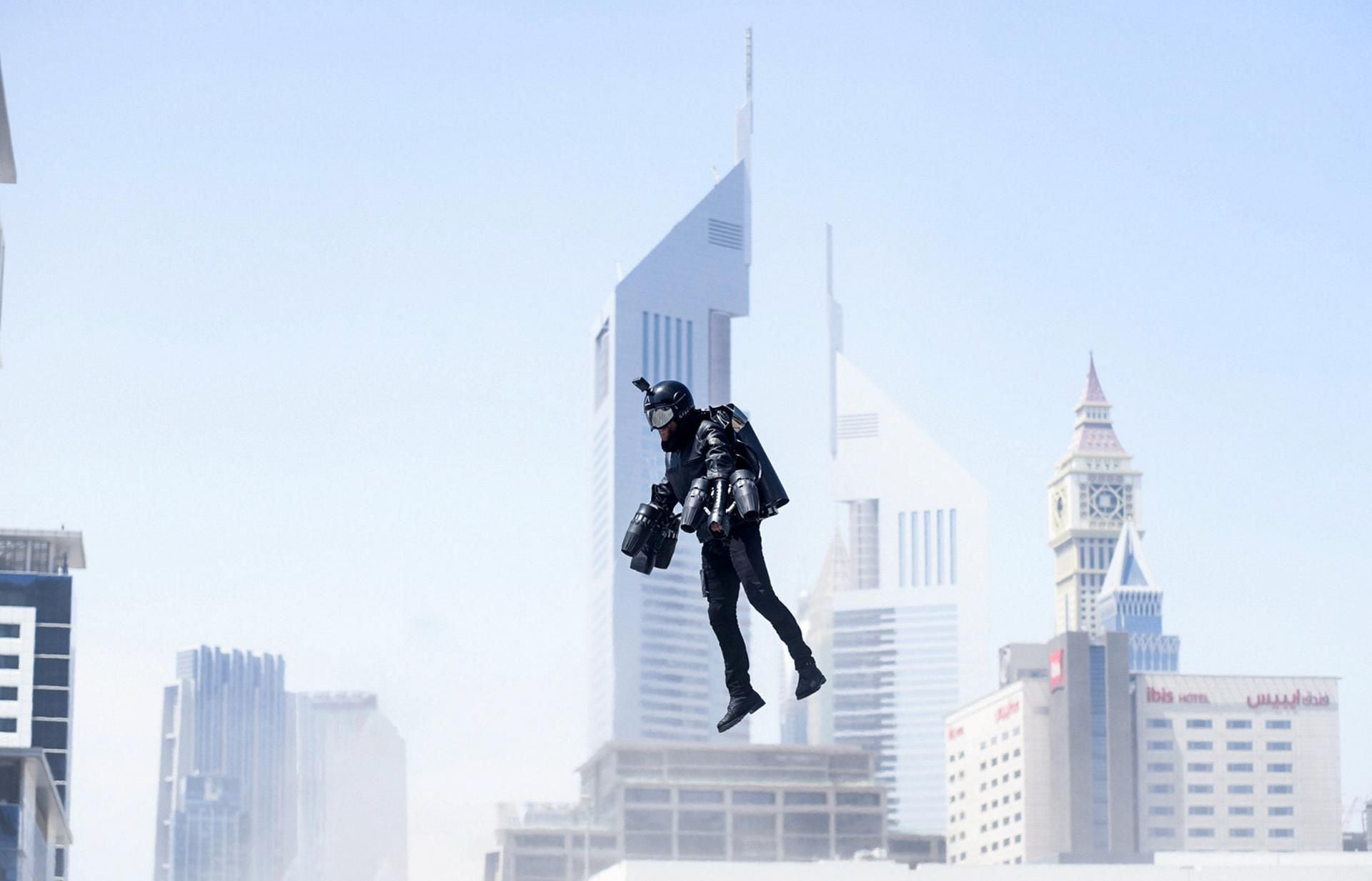 Watch Two Men With Jetpacks Fly Over Tallest Building In Dubai 