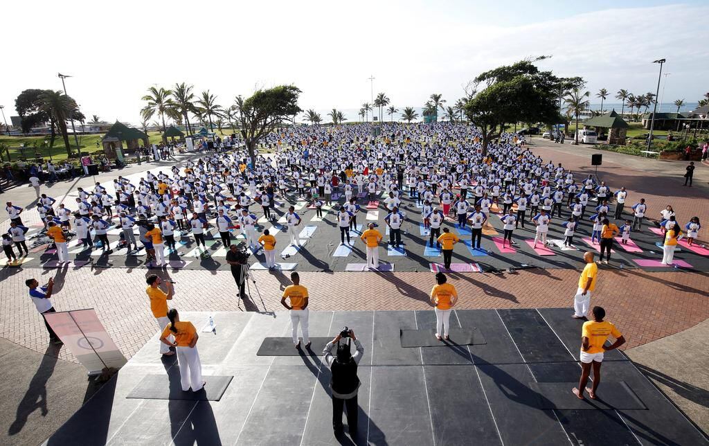Indian armed forces and their families members perform Yoga on the