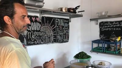 Mo Jo Hammoud makes a batch of the tasty hummus in his kitchen at The Hummus Bar. Alexandra Talty