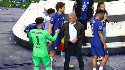 Chelsea goalkeeper Kepa Arrizabalaga celebrates with owner Roman Abramovich after winning the Champions League. Reuters