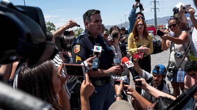 El Paso Police Department Sgt. Robert Gomez briefs media on the shooting. AFP