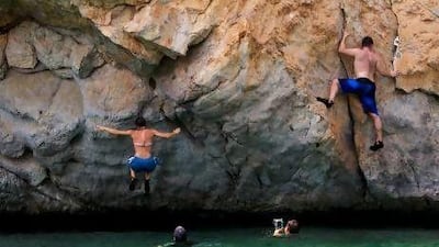 Deep water soloing climbers who lose their grip simply fall into the warm water. Christopher Pike / The National