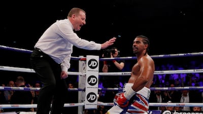 David Haye looks on as he is given a count by the referee. Andrew Couldridge / Reuters