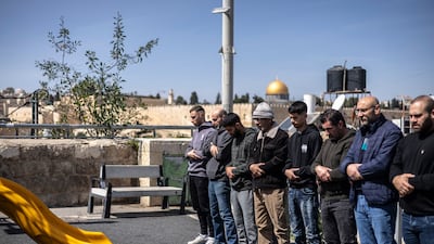Prayers were held on a street near Ras Al Amud Mosque, overlooking the Al Aqsa compound, Jerusalem. AFP