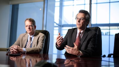 John Chambers, the managing director and chairman of the sovereign ratings committee at Standard and Poor’s, left, and Moritz Kraemer, the chief ratings officer, sovereign ratings at Standard and Poor’s. Sarah Dea / The National