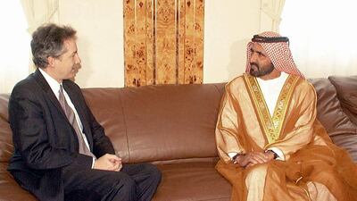 Emirati Defence Minister Mohammad bin Rashed al-Maktoum (R) meets with US Assistant Secretary of State for Near Eastern Affairs William Burns in Dubai 15 January 2002. Burns launched his Middle east tour in Kuwait and Qatar a few days ago concentrating on the war on terrorism, Iraq and the Mideast peace process. AFP PHOTO/HO (Photo by WAM / AFP)