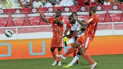 Grafite, centre, scored Al Ahli's second of the night and his 18th of the season in last night's match against Ajman. Jeffrey E Biteng / The National