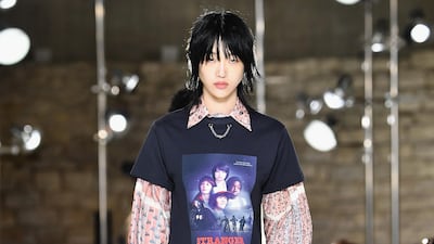 A Stranger Things T-shirt makes a suprise appearance on the catwalk at Louis Vuitton's spring/summer 2018 show during Paris Fashion Week. Pascal Le Segretain / Getty Images