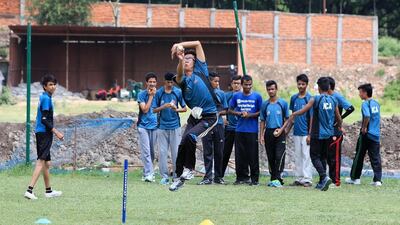 Students go through bowling practice at the Nepal National Cricket Academy in Kathmandu. Pawan Singh / The National