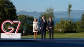 French President Emmanuel Macron and his wife Brigitte Macron welcome US President Donald Trump during the G7 summit in Evian, France. Reuters