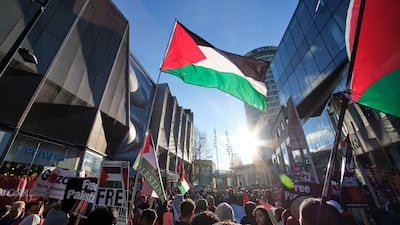 Thousands of protesters gather on a street in Birmingham city centre to march for a ceasefire in Gaza. Alamy