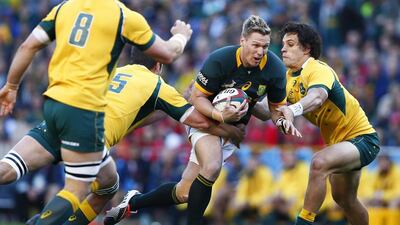 Jean de Villiers, second from right, ran through Australia's defence for a pair of tries as South Africa rallied to defeat the Wallabies in their Rugby Championship 2match at Newlands Stadium in Cape Town, South Africa on September 27, 2014. NIC BOTHMA / EPA