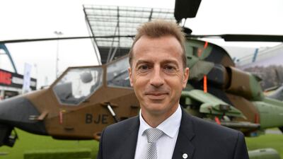 Airbus Helicopters CEO, Guillaume Faury in front of an Airbus military helicopter. Janek Skarzysky / AFP
