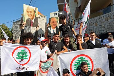 Supporters Samir Geagea gather in front of his home. AFP