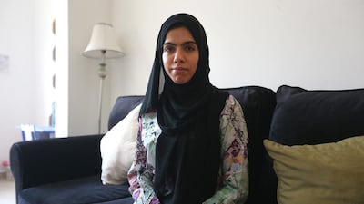 Emirati Umm Saeed gets just Dh6,000 a month in alimony despite having to take care of her three children. She and her children live in a small studio apartment because she cannot afford a higher rent. Fatima Al Marzooqi / The National