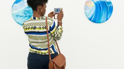 Visitors at Kathryn Wilson's exhibition Saturate, at FN Designs. Courtesy of Kathryn Wilson