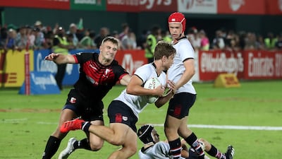 Players in action during the Gulf Under 19 boys cup final match between Dubai English Speaking College (black) vs Dubai College.