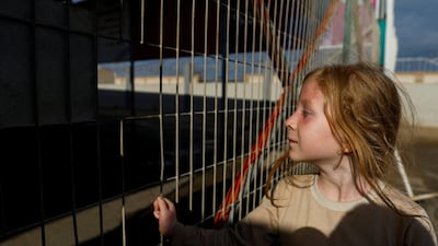 A Palestinian with dual citizenship waits outside the Rafah crossing with Egypt. Reuters