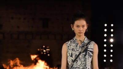 A model walks the runway during the Christian Dior Cruise 2020 show. Getty Images
