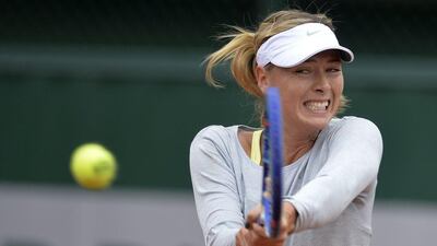 Maria Sharapova takes part in a training session ahead of the French Open on Saturday. Miguel Medina / AFP / May 24, 2015