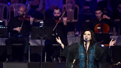 Lebanese diva Jahida Wehbe (R) performs on stage during the annual Baalbeck International Festival in Baalbeck, Beqaa Valley, Lebanon.