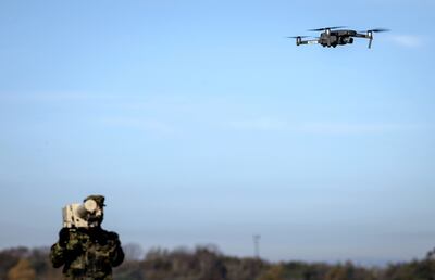 A soldier operates a 'jam' during a counter-drone exercise in Vredepeel, the Netherlands. AFP