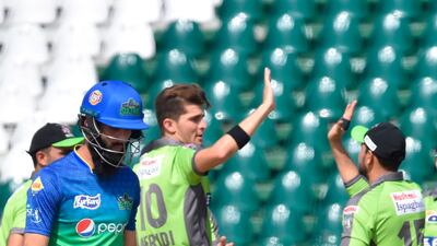 Multan Sultans batsman Moeen Ali walks back to the pavilion after his dismissal. AFP