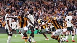 HULL, ENGLAND - AUGUST 22: Nobel Mendy of Hull City celebrates scoring his team’s second goal with teammate John Egan during the Premier League 2026/27 match between Hull City and Manchester United at MKM Stadium on August 22, 2026 in Hull, England. (Photo by George Wood / Getty Images)