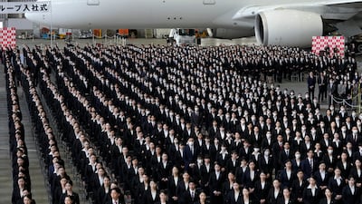 New Japan Airlines Group employees attend the company entrance ceremony at Haneda Airport in Tokyo. EPA