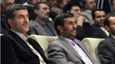 Iran's President Mahmoud Ahmadinejad (right) and first vice-president Esfandiar Rahim Mashaei: Mr Mashaie has been accused of putting the president under a spell.