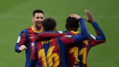 Lionel Messi congratulates Ousmane Dembele after his goal. AFP