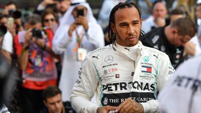 Hamilton is pictured on the grid. AFP