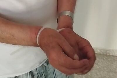 Najih Tawil was left with his hands still bound with cable ties when troops left his home. Photo:Fawzi Hussein