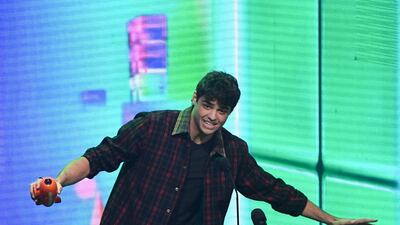Favourite movie actor winner for 'To All the Boys I've Loved Before' Noah Centineo appears on stage. AFP