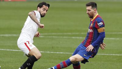 Barcelona's Lionel Messi and Suso of Sevilla. EPA