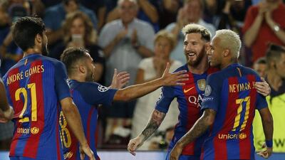 Barcelona's Lionel Messi celebrates scoring their second goal with Neymar. Albert Gea / Reuters