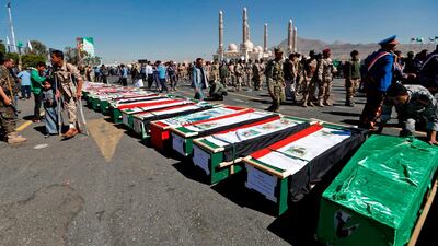 Supporters of the Houthi movement attend the funeral of those killed during recent clashes between Houthi rebels and loyalists of Yemen's late ex-president Ali Abdullah Saleh, in the capital Sanaa on December 7, 2017. Mohammed Huwais / AFP