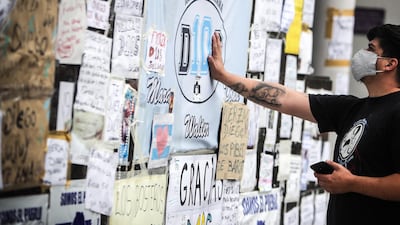 Fans visit the Olivos Clinic. EPA