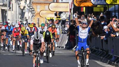 Julian Alaphilippe celebrates victory. AFP
