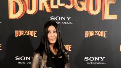 Cher, in a gold jacket, attends 'Burlesque' photo call at Villamagna Hotel on December 9, 2010 in Madrid, Spain. Getty Images