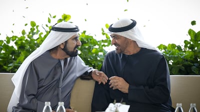 President Sheikh Mohamed has presented Sheikh Mohammed bin Rashid, Vice President and Ruler of Dubai, with a photo album documenting his years of service to the nation. All photos: UAE Presidential Court