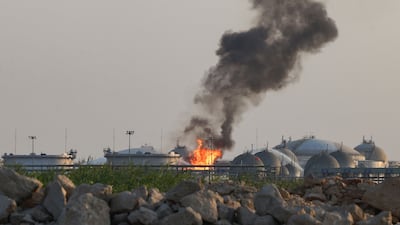 Flames burn at a facility belonging to Saudi oil giant Aramco south of Riyadh on October 3, 2026. AFP