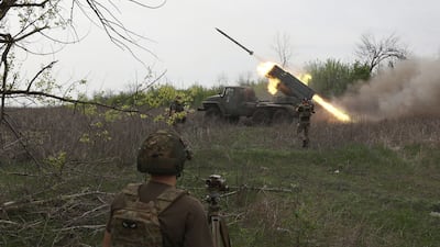 Ukrainian soldiers fire at Russian positions near the town of Kupyansk, Kharkiv Region. AFP