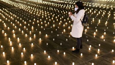 Activists lit about 12,000 candles in Bern, Switzerland, in memory of the people who have died from Covid-19 in the country. EPA