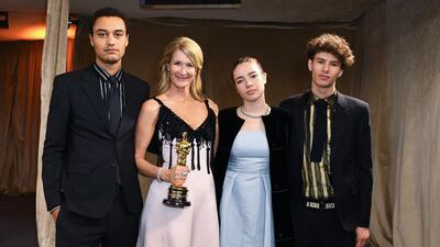 Laura Dern, winner for Best Actress in a Supporting Role for "Marriage Story", with her children at the Governors Ball after the Oscars on Sunday, February 9, 2020, at the Dolby Theatre in Los Angeles. AFP