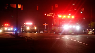 An ambulance believed to be carrying an alleged shooter arrives at the Wake Medical Centre Emergeny Room in Raleigh, North Carolina. AP