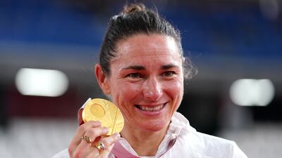 Great Britain's Sarah Storey celebrates with the gold medal. PA