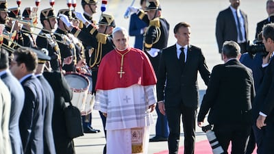 Pope Leo XIV with French President Emmanuel Macron at Paris Orly Airport on September 25. AFP