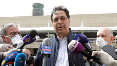 Lebanese Prime Minister Hassan Diab speaks to the media outside Beirut's international airport, Lebanon April 5, 2020. Reuters