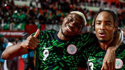 Victor Osimhen, left, celebrates with Bruno Onyemaechi after Nigeria's win over Tunisia. AFP